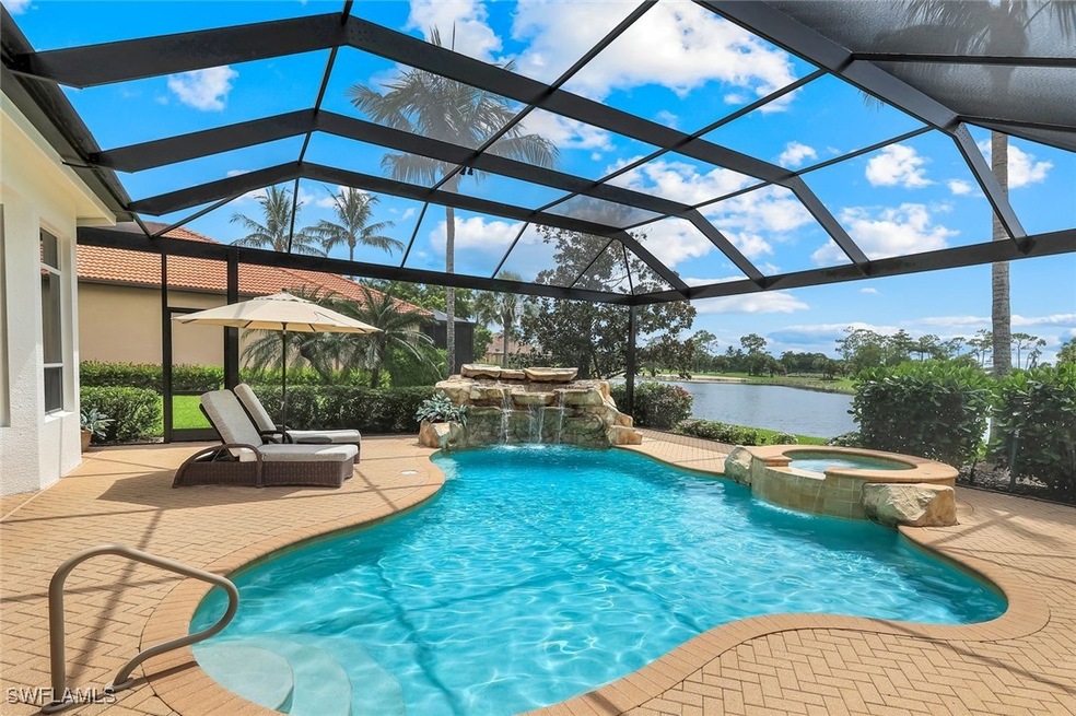 View of pool and lanai with beautiful water view.