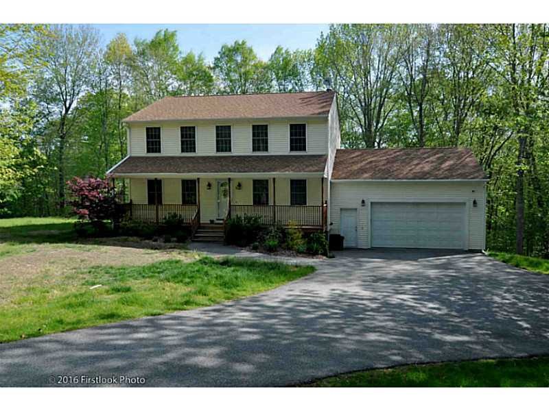 Exterior Front. Farmers Porch. Large double garage
