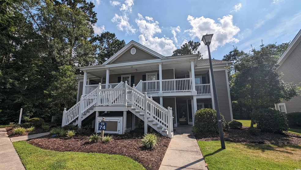 Coastal home featuring a porch