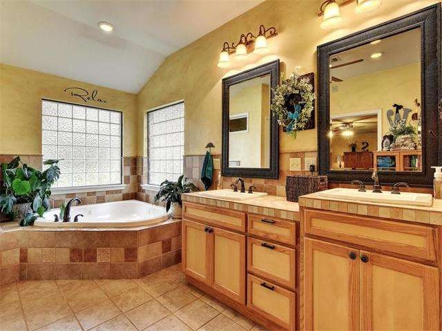 This HUGE master bath was added a few years ago. F