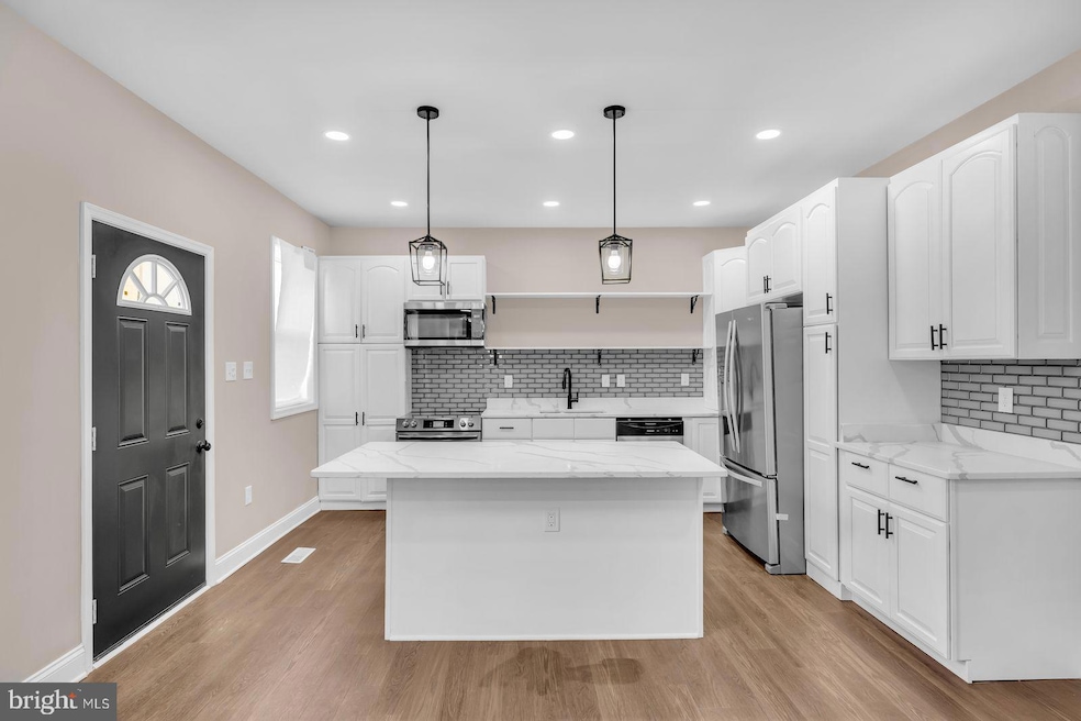 2045 E 31st St, Baltimore, MD 21218 - photo 1