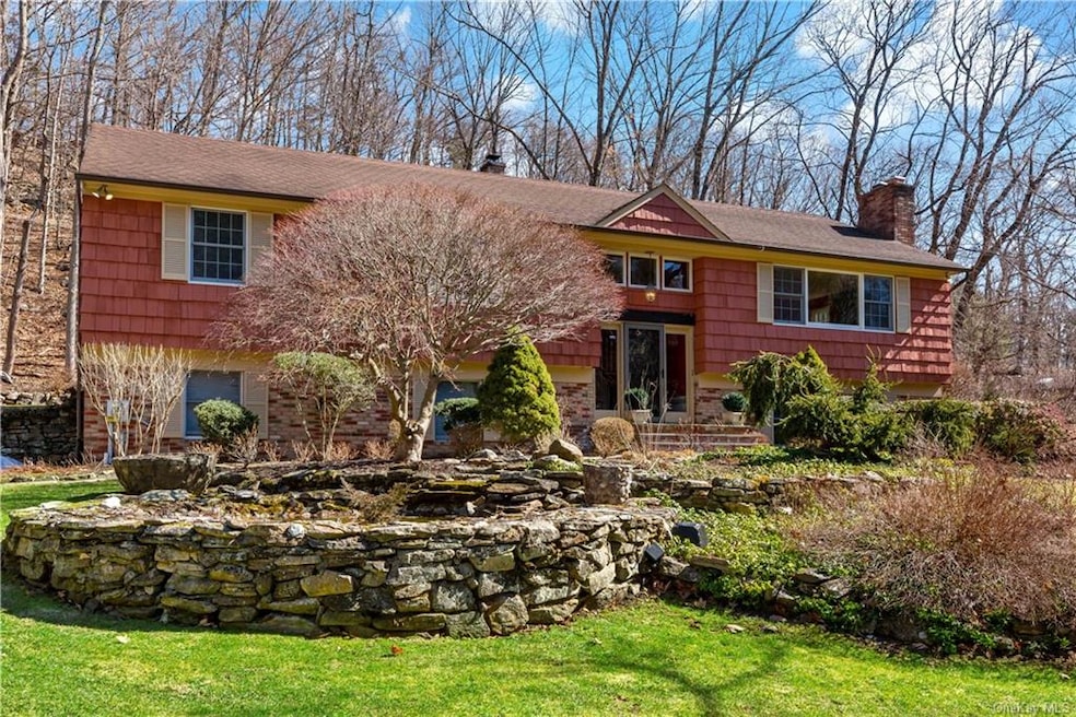 Welcome Home to 146 Hardscrabble Road. Set far bac
