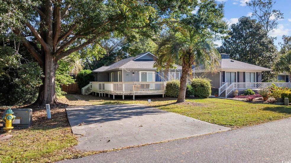 View of front of property with a front yard and a 