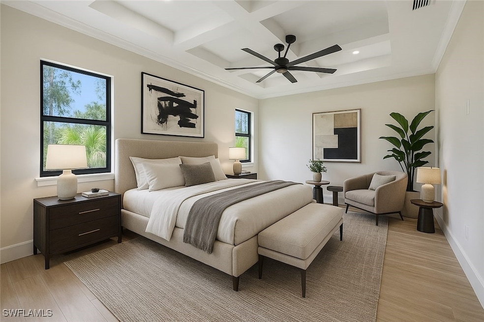Bedroom with recessed lighting, coffered ceiling,