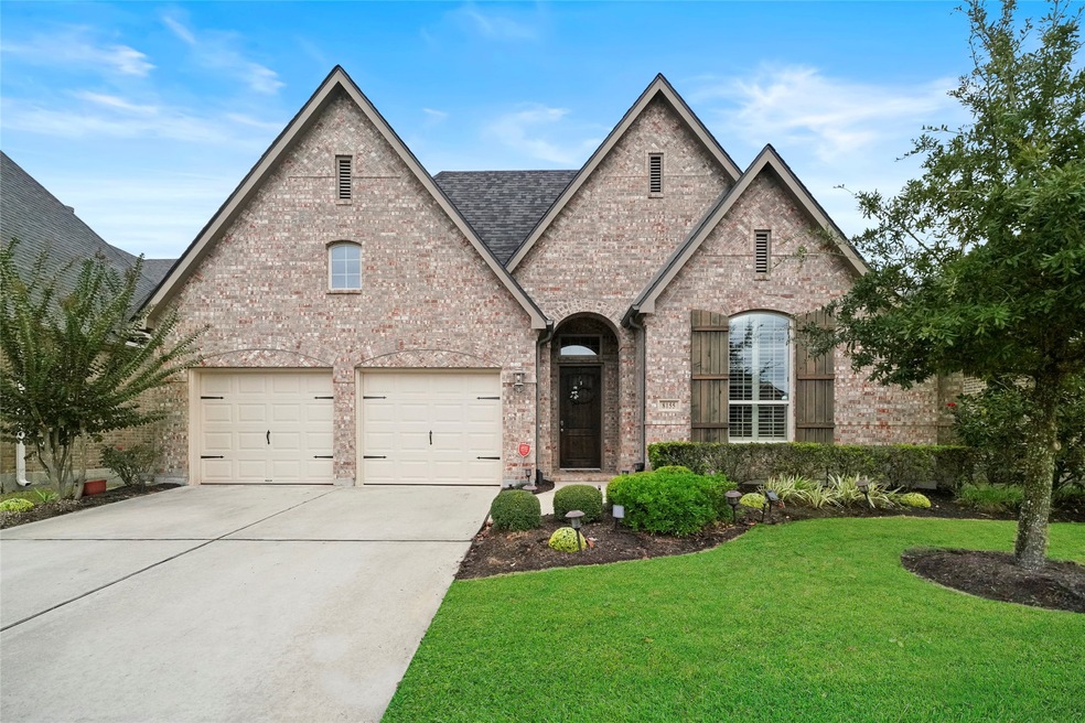 Welcome to 8155 Little Scarlet St in the highly desirable gated community of Harpers Preserve!