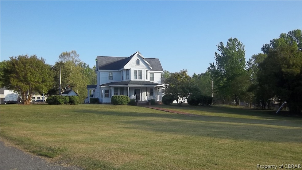 View of front of property with a front lawn