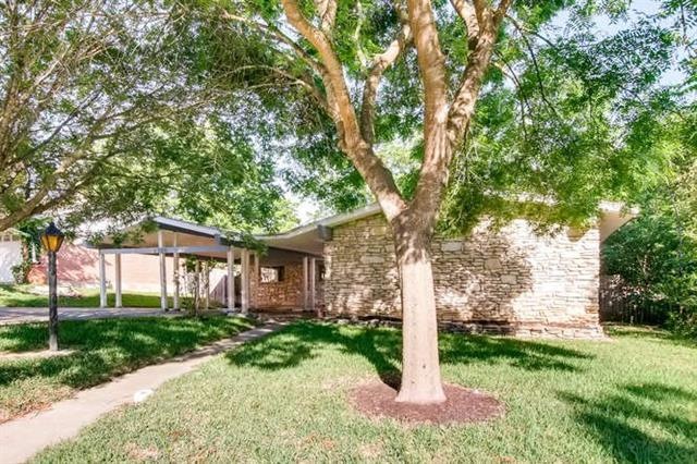 Welcome home to this remodeled mid century home of