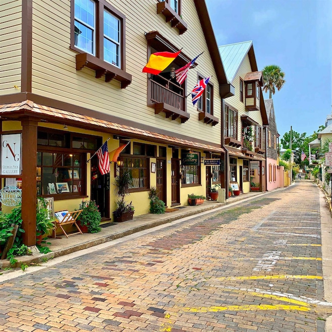 View of property with a residential view