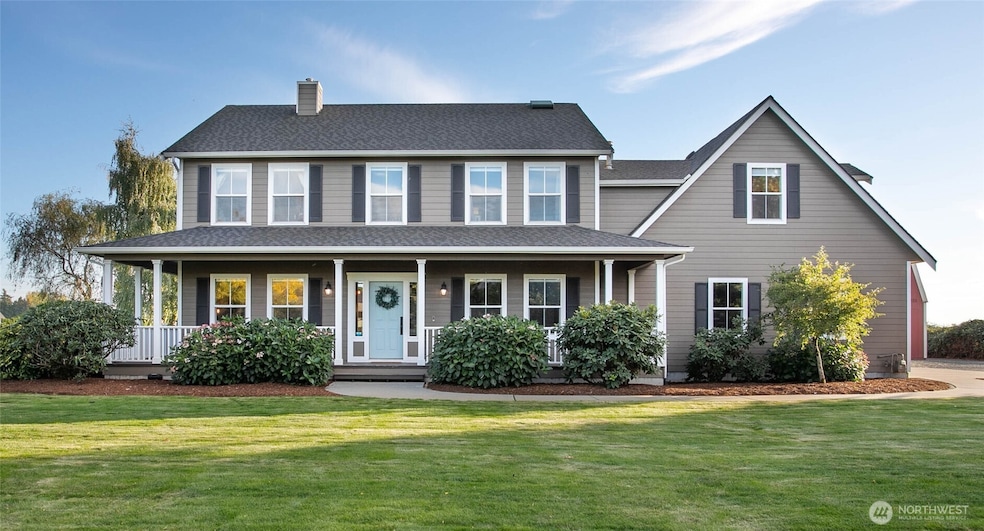 Mid-county living at its finest, wraparound deck and all.