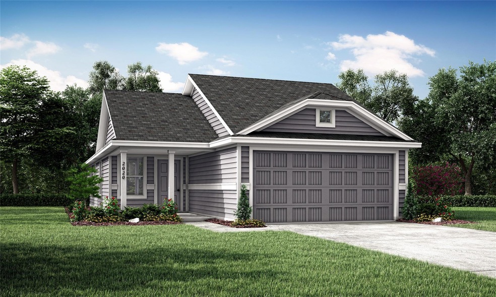 View of front of house with a garage and a front l