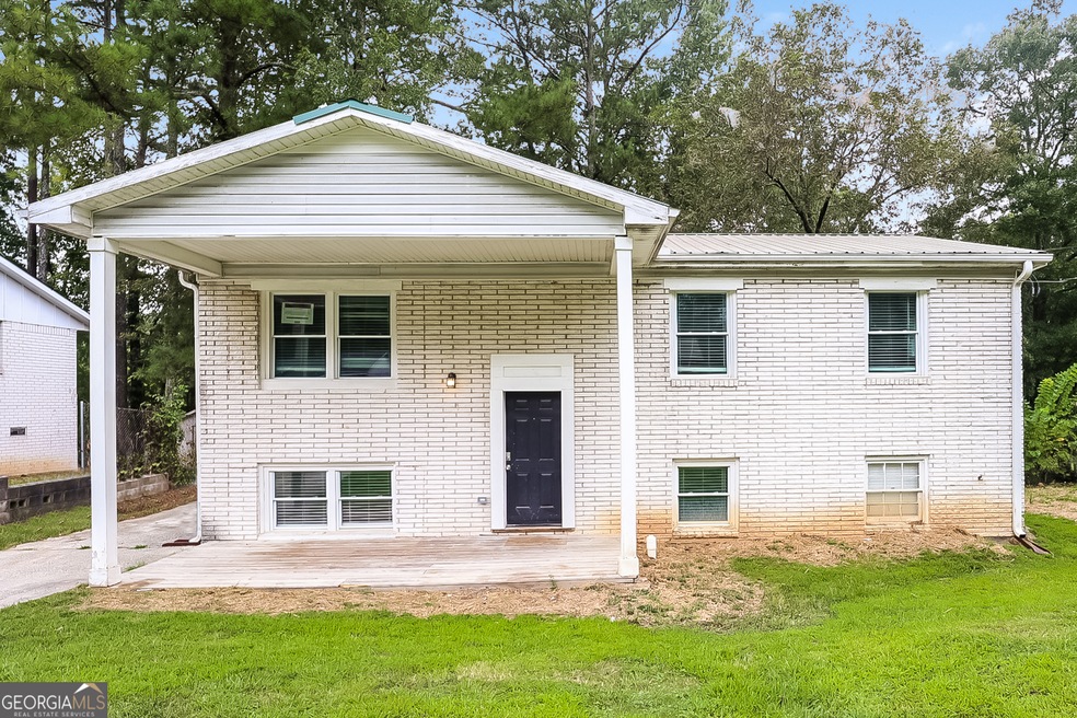 2889 Carriage Ln, Atlanta, GA 30349 - photo 1