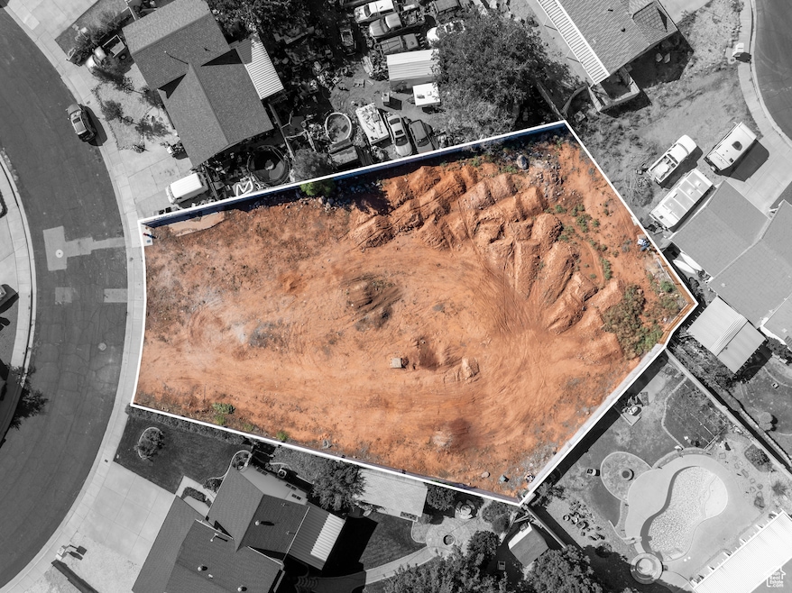Aerial view of property and surrounding area featuring property boundaries highlighted
