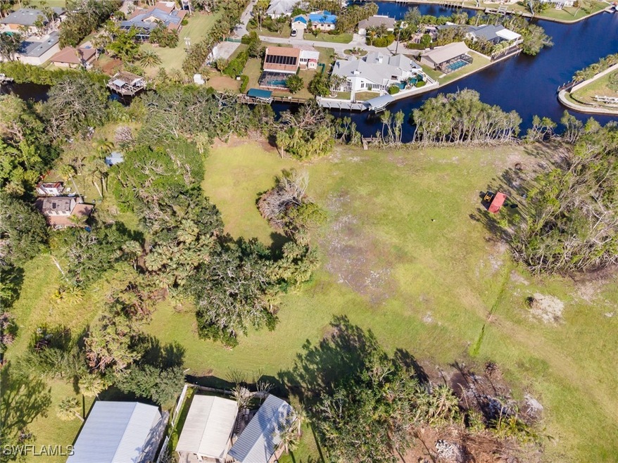 Aerial view of lot with canal access