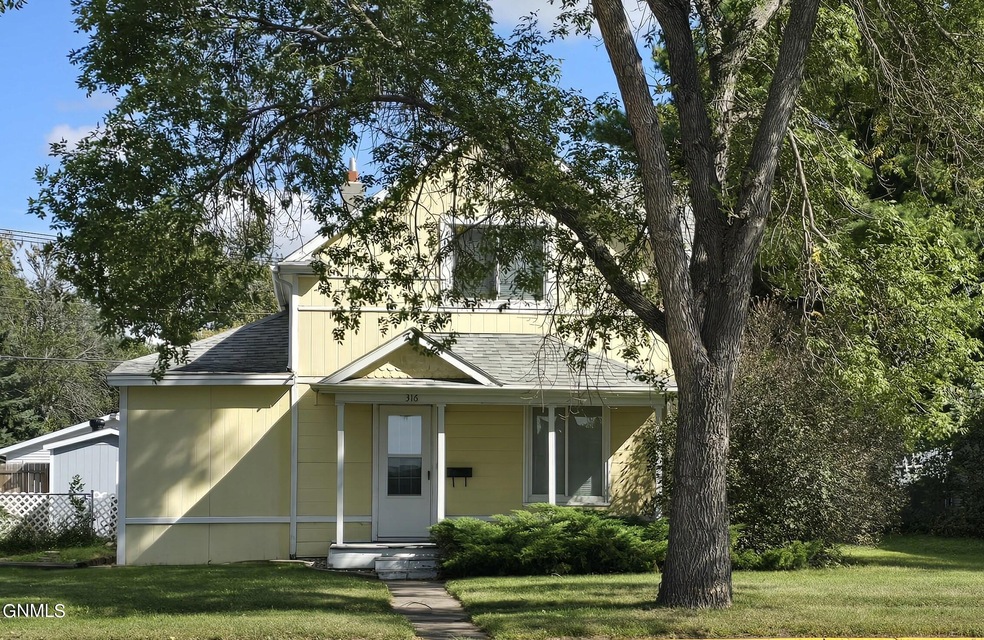 316 4th Ave NE, Jamestown, ND 58401 - photo 1