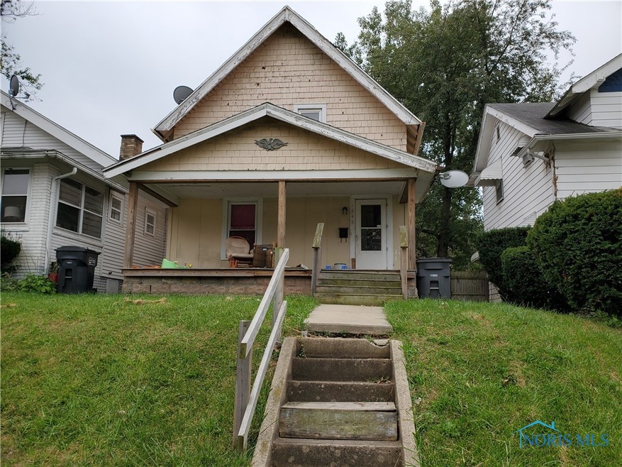 1845 Front view with wide full length front porch