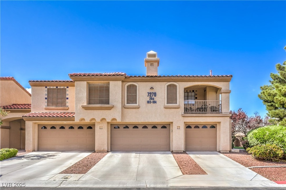 Mediterranean / spanish home featuring a chimney,
