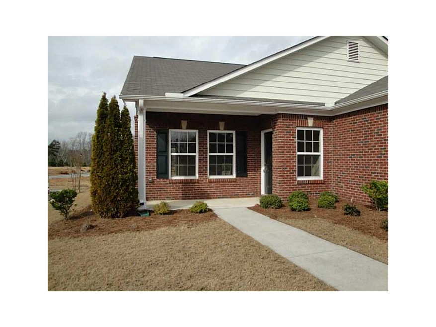 Exterior Front. Private, end-unit home