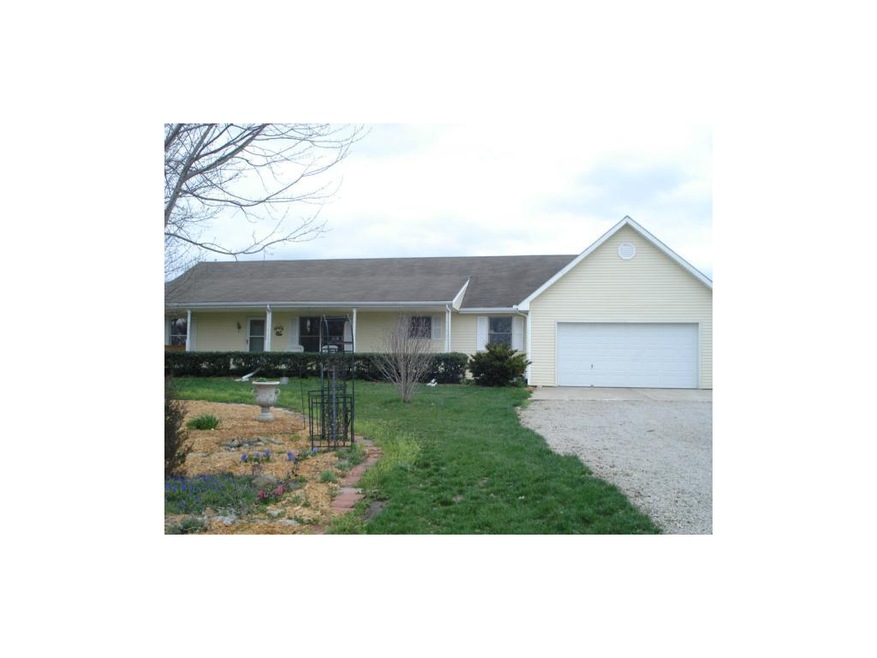 VINYL SIDED RANCH WITH WALK OUT BSMT