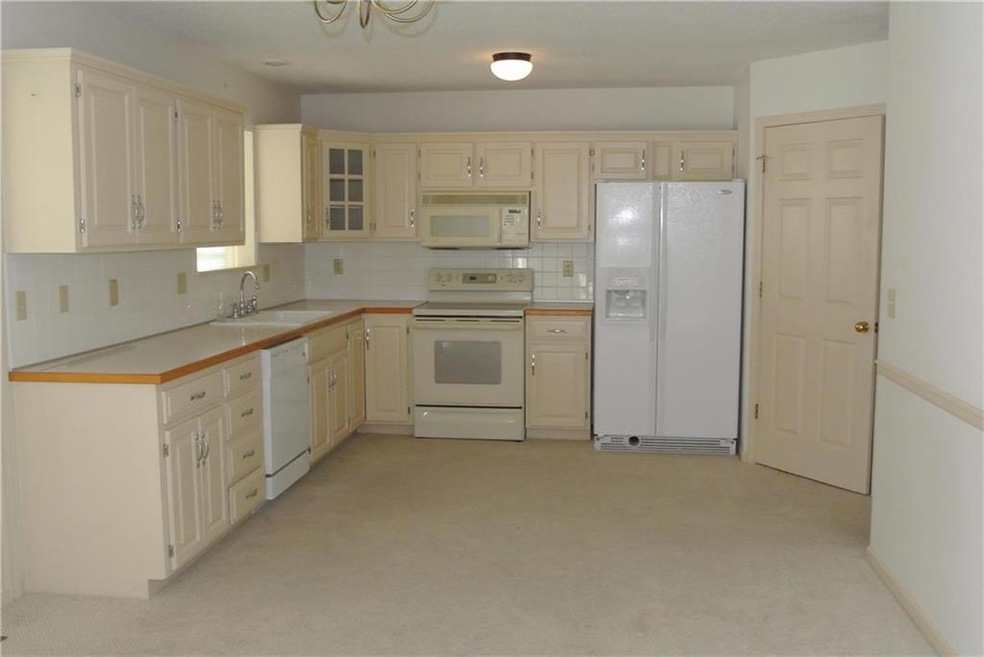 712 Meadow Ln, Raymore, MO 64083 - photo 1