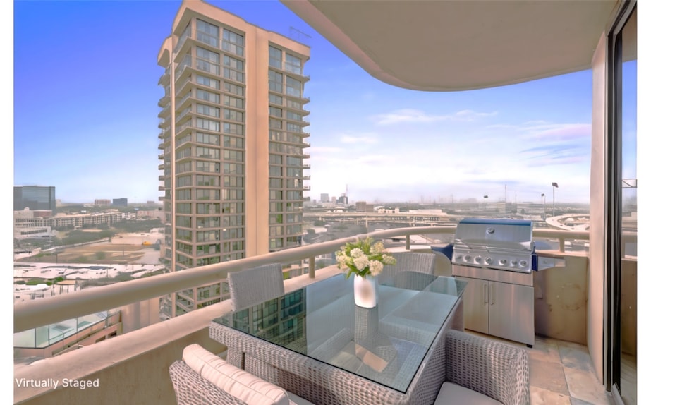 The balcony of this luxurious unit provides breath