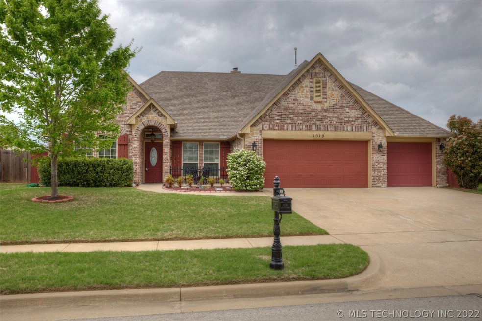 Extended 3 car garage. Easily fits large truck. Br
