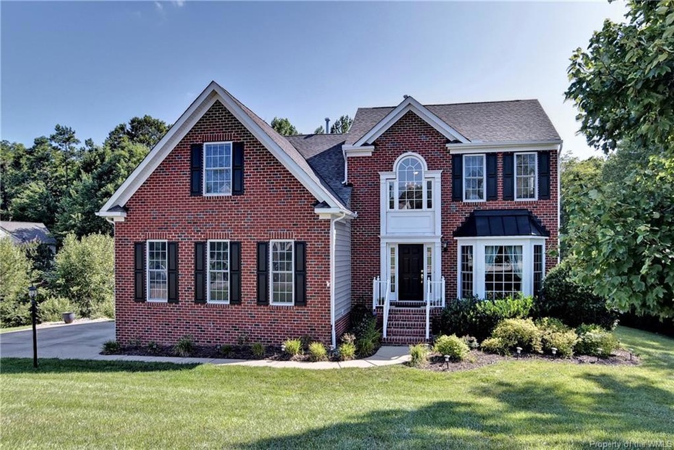 Welcome to 9396 Ashlock Court in Stonehouse Glen! Beautiful 4 Bedroom Transitional on a .41 Acre lot.