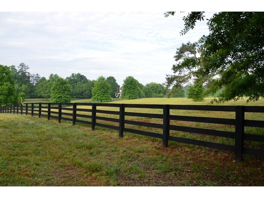 5.75 acres, almost all pasture with board fence.  
