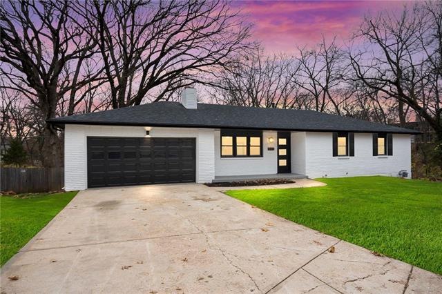 Brick front ranch with new doors, windows & paint