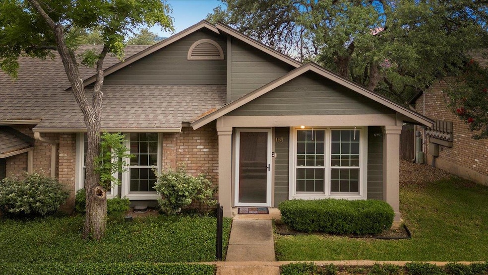 View of front facade featuring roof with shingles
