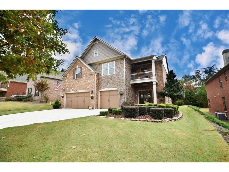 Beautiful 3 sided brick home with stone accents, 3