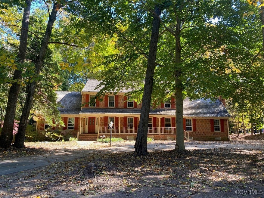Colonial inspired home with covered porch