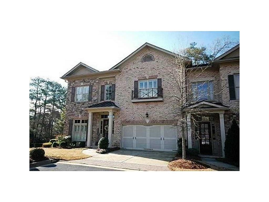 Exterior Front. Wonderful end unit townhome in hig