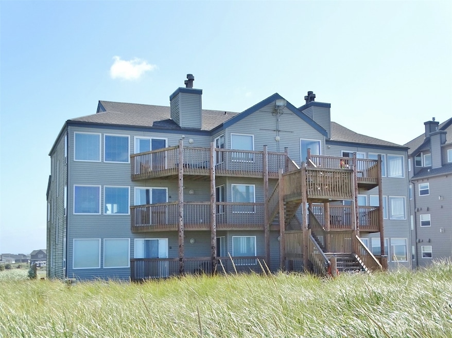 Rear view of Pacific Avenue, a 6-unit Timeshare Building on the Ocean close to the Jetty.  (#2N is on the left, 2nd-floor)