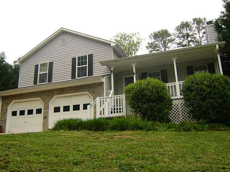 Exterior Front. 3 bedroom, 2 bath split level on o