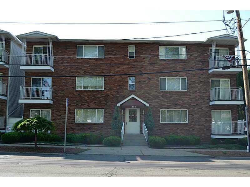 Exterior Front. The unit is on the left 2nd floor