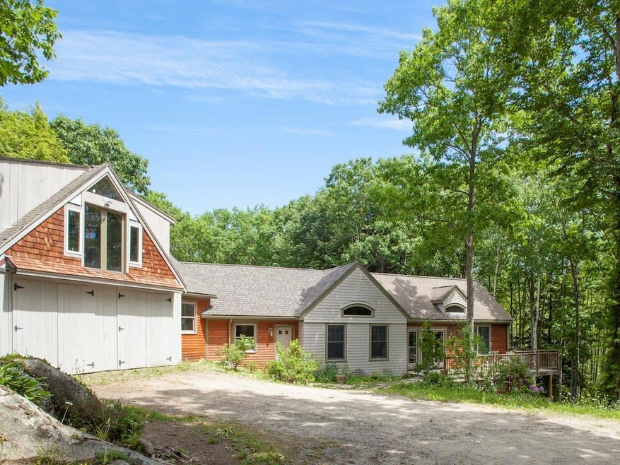 Custom built home nestled into a...