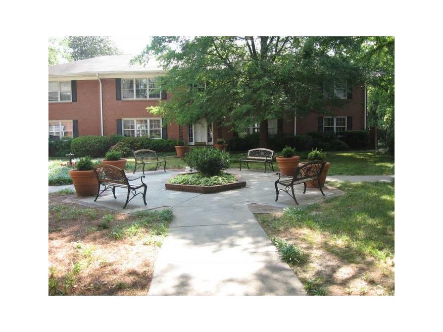 Exterior Front. The wonderful courtyard adds to th