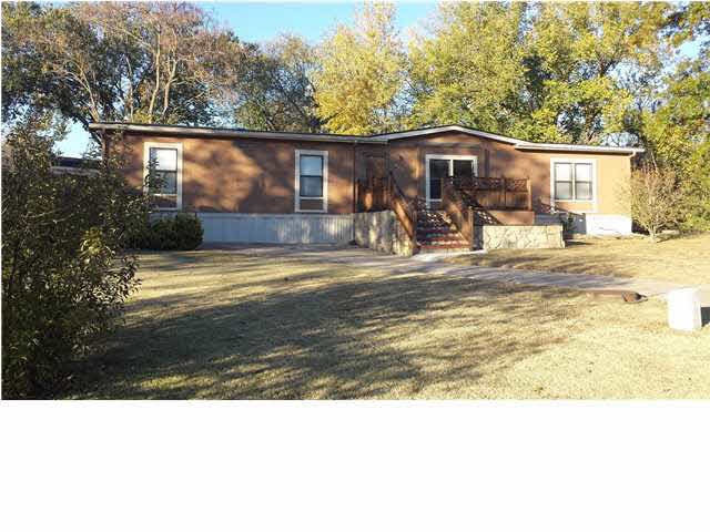 Nice curb appeal on a cul-de-sac wooded lot.