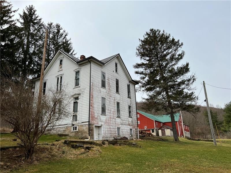 Main house back with barn view