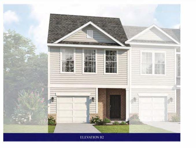 View of front property with a garage