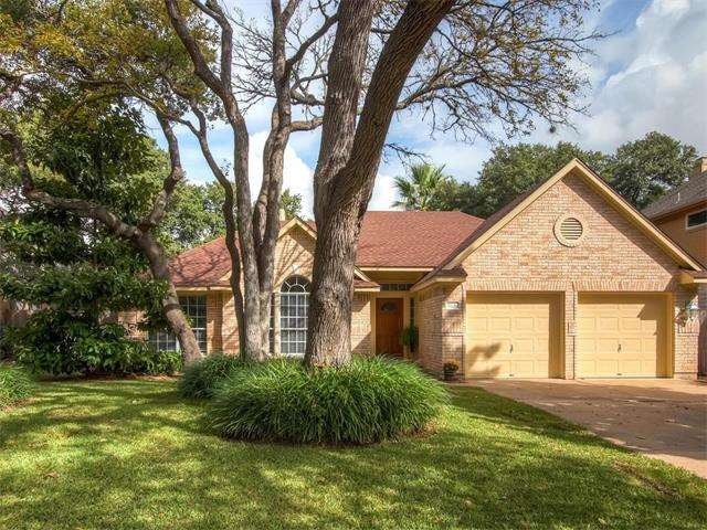 David Weekley single story nestled behind mature t