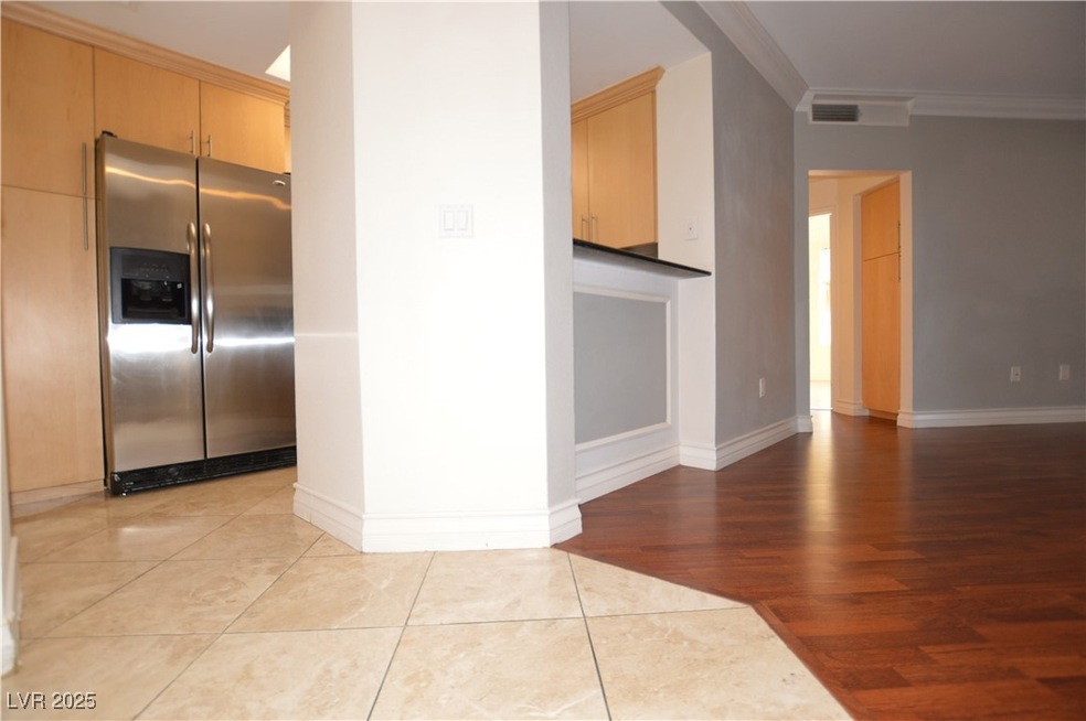 Kitchen with baseboards, light wood-type flooring,