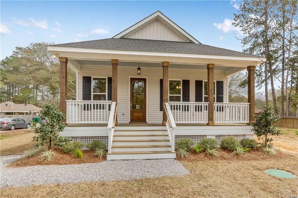 Farmhouse cottage with stunning front porch