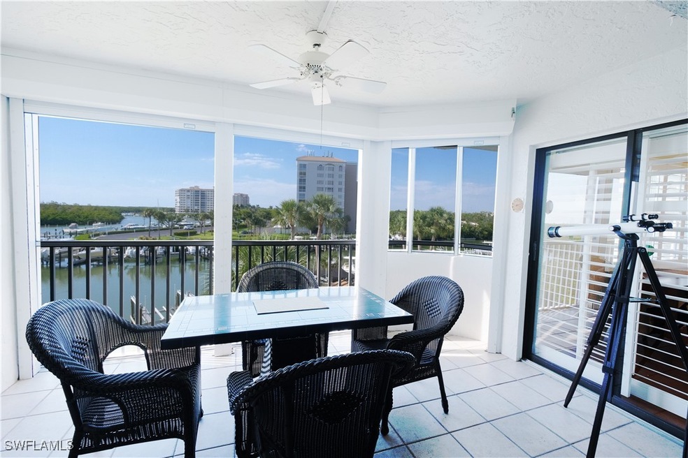 12945 Vanderbilt Dr unit 402, Naples, FL 34110 - photo 1