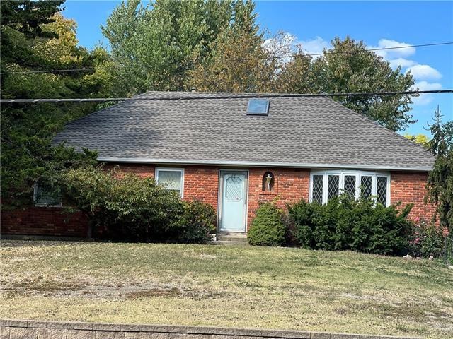 504 W Lucy Webb Rd, Raymore, MO 64083 - photo 1