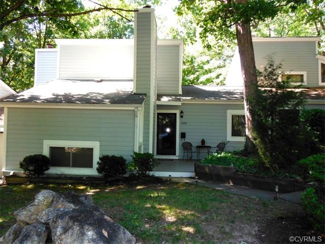 Retreat type setting with mature landscaping, rock
