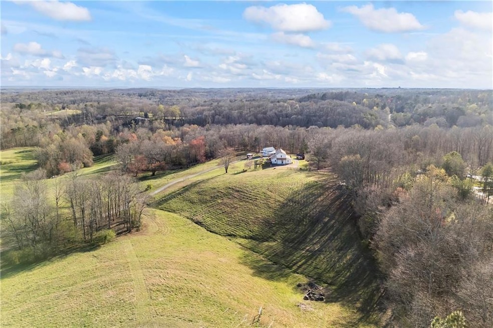 Incredible 12.46 acre family homestead & mini farm