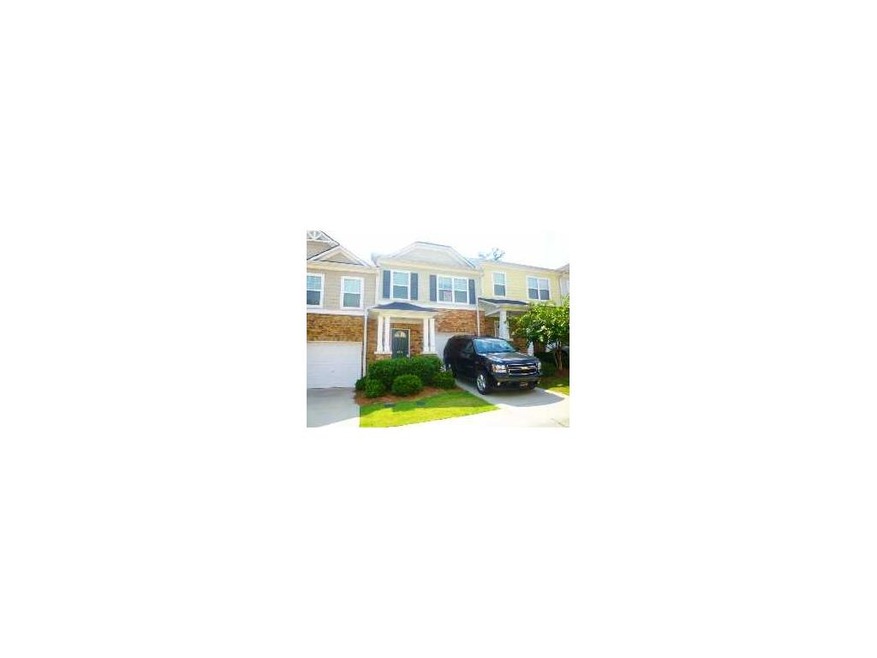 Exterior Front. Beautiful townhome with partial br