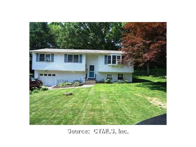 Exterior Front. Located on a lovely lot and minute