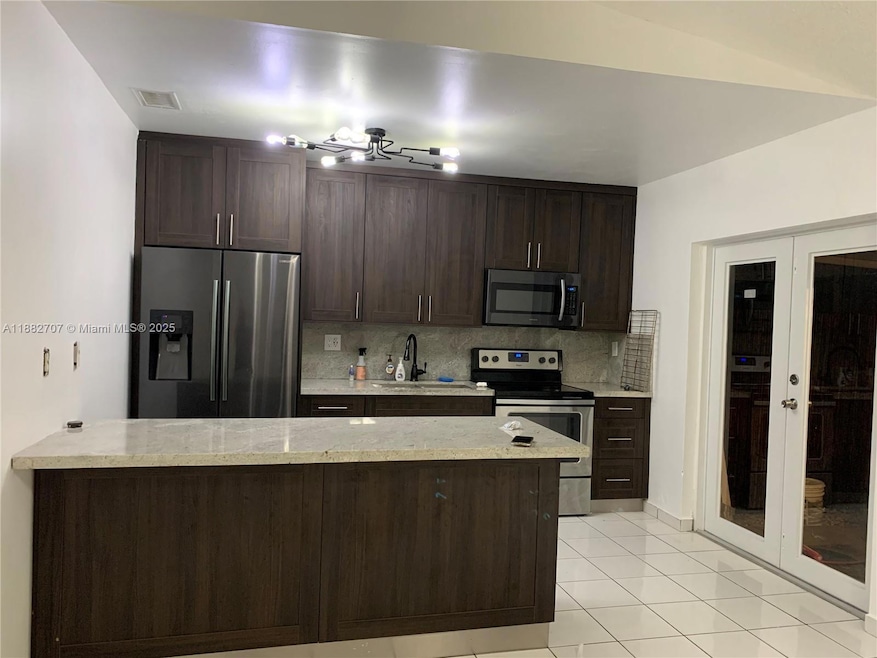 3298 W 70th St unit 101, Hialeah, FL 33018 - photo 1